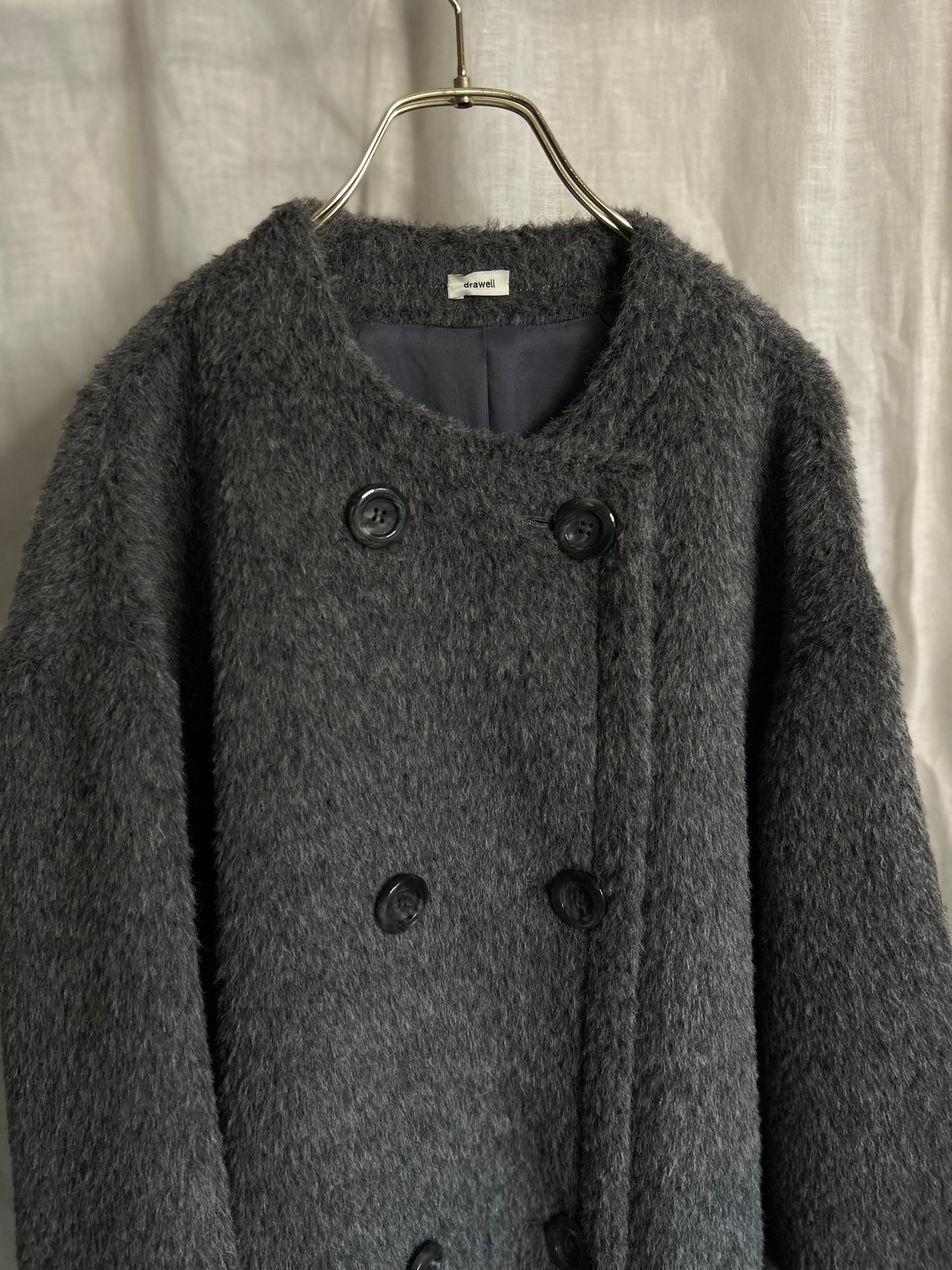 2025AWアルパカシャギーノーカラーAラインコート