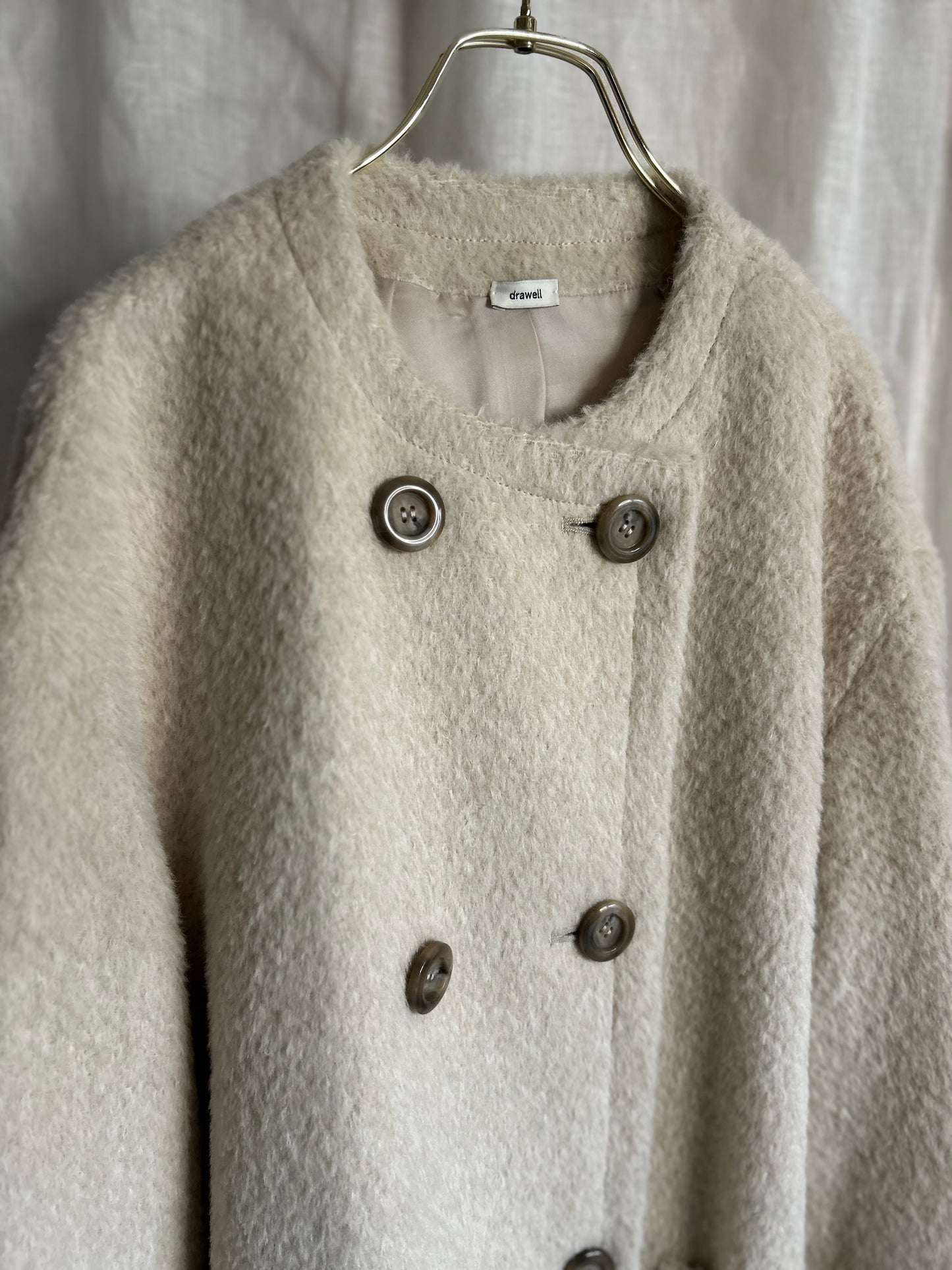 2025AWアルパカシャギーノーカラーAラインコート