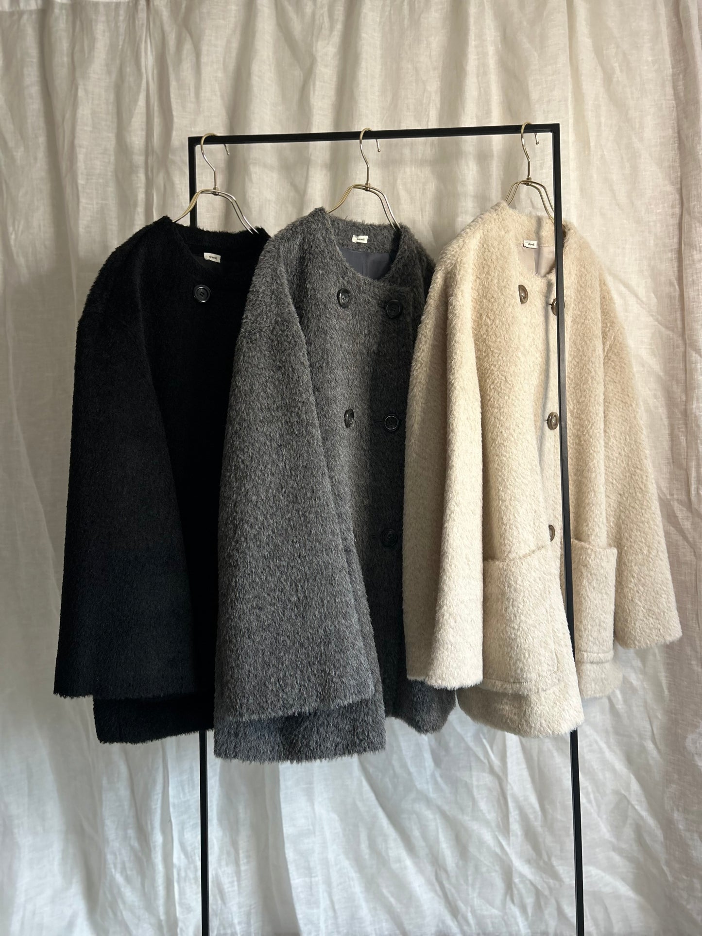 2025AWアルパカシャギーノーカラーAラインコート